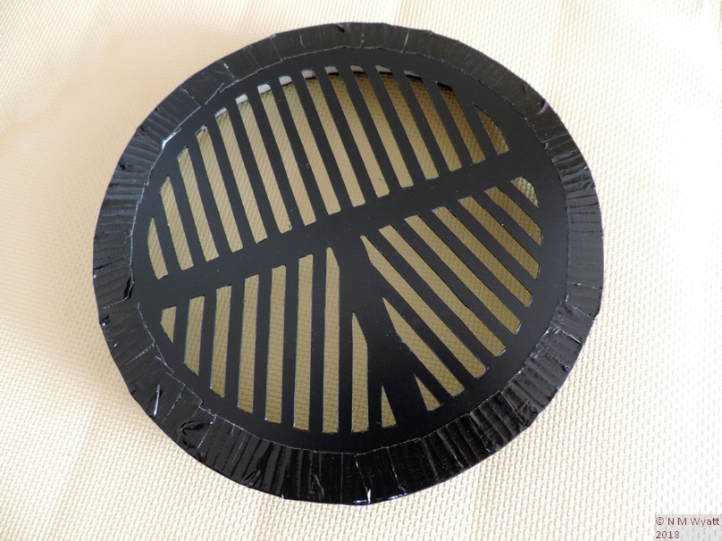 Bhatinov Mask A Bahtinov mask cut from a plastic folder